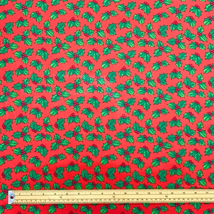 1 Metre Christmas Holly Leaves on Red 110cm/43" Polycotton Fabric